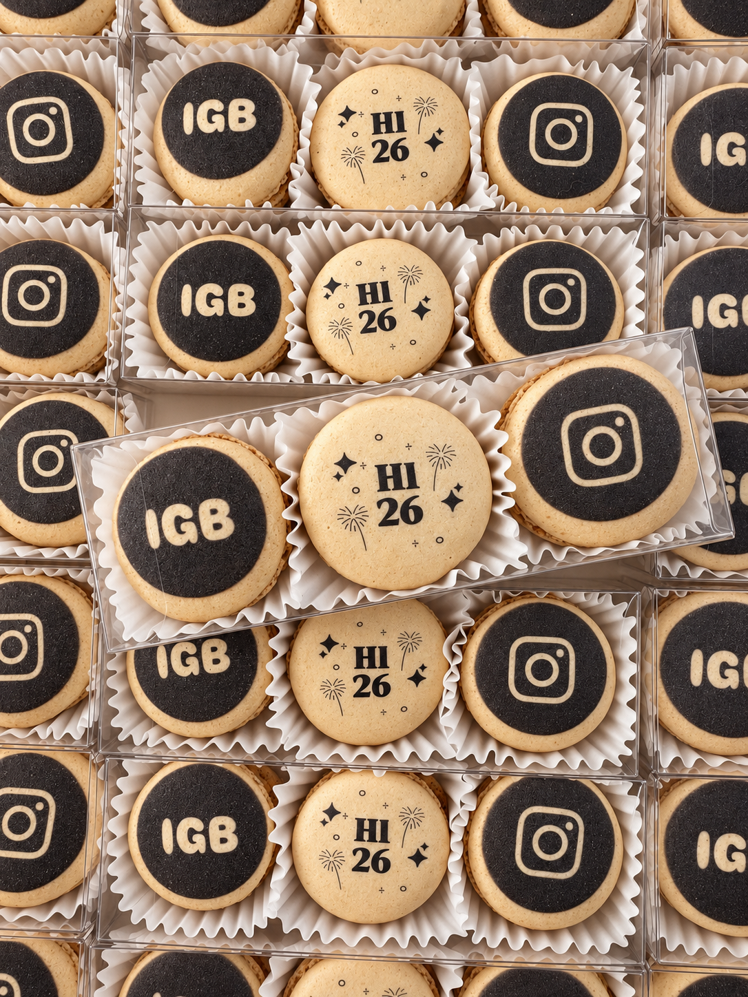 Favor boxes of macarons printed with IGB, H1 26 and Instagram logos
