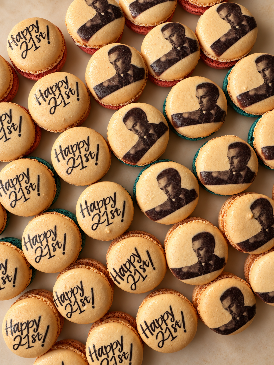 Macarons printed with Happy 21st lettering and a black-and-white portrait photo