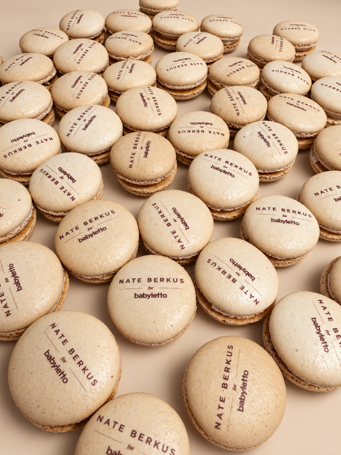 Natural-color macarons printed with the Nate Berkus x Babyletto logo